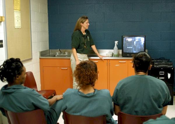 A counselor holding a session for female inmates at the Adult Detention Center