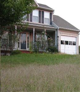 Tall grass vacant home.jpg
