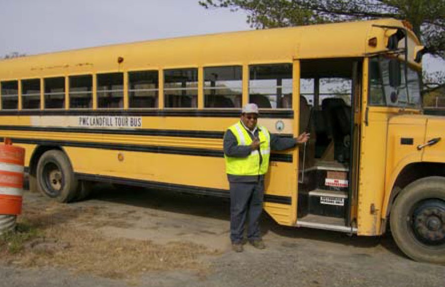 Tour Bus with tour guide at the door.jpg