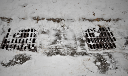 Snow on storm grate