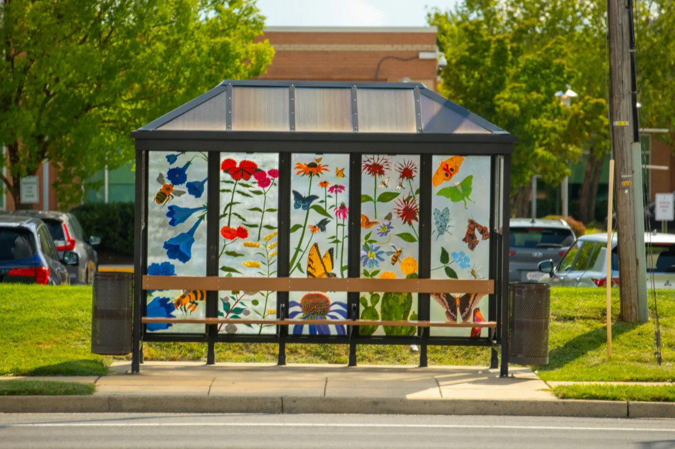 Painted bus shelter with butterflies and flowers